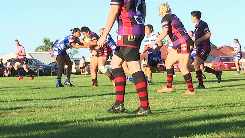 A Toowoomba Valleys Fillies player attacks the line of the defence.