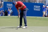 Adam Scott's putt rolls past the hole during a play-off at the Wyndham Championship.