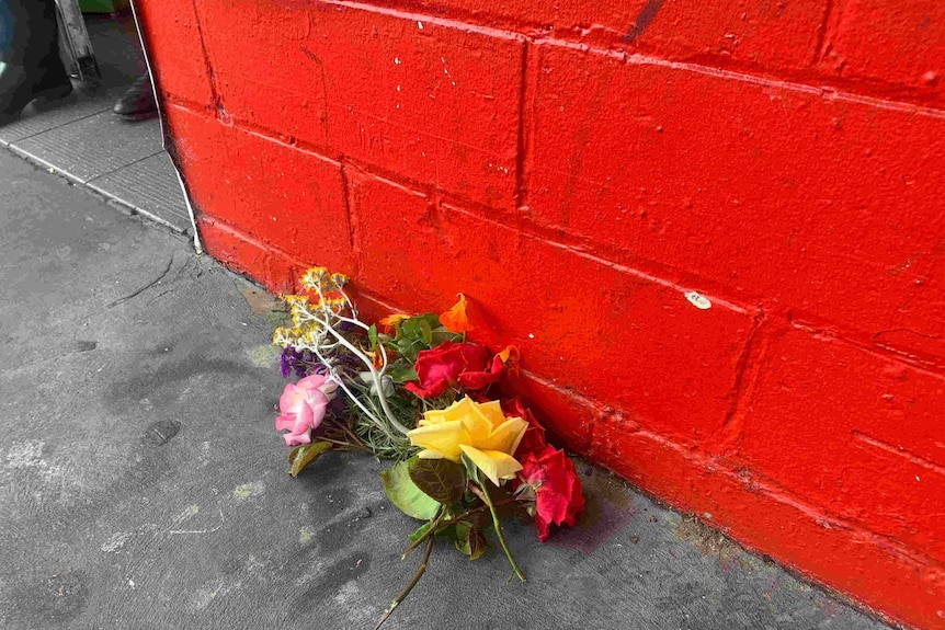 Floral tribute to stabbing victim at Blackmans Bay