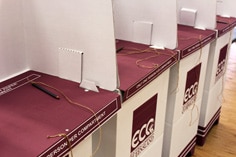 A row of cardboard voting booths used in Queensland election from ECQ