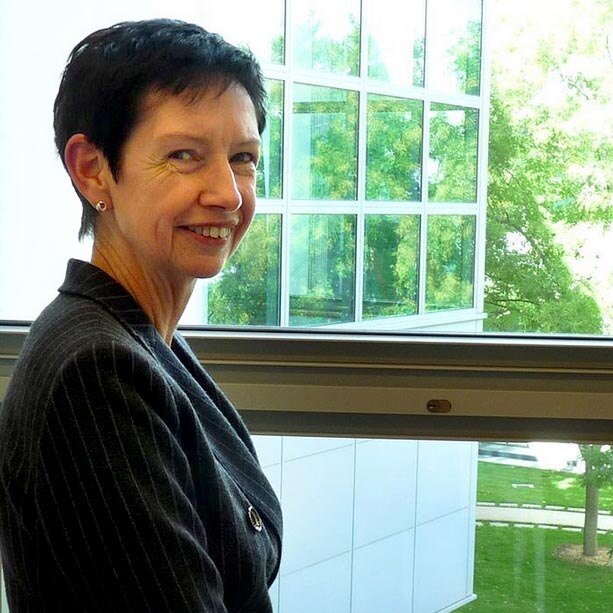 Parliament's sacked chief bureaucrat Carol Mills breaks down in front