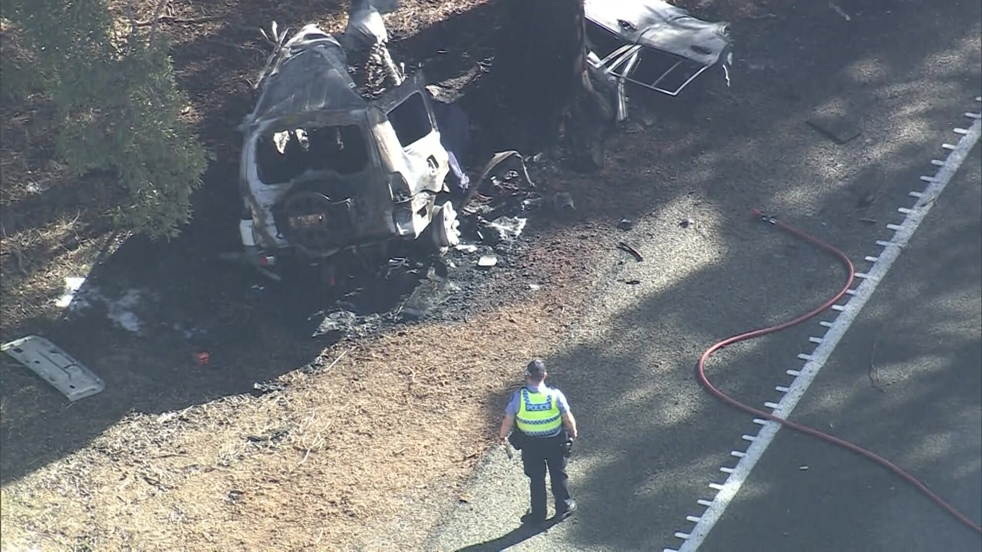 The wreckate of a 4WD after it crashed into a tree 
