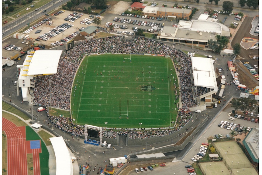 An aerial shot of a sold out rugby league stadium. 