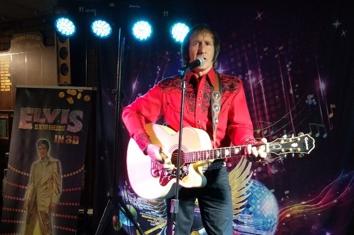 Rod Toovey Elvis tribute performer wearing a Red shirt