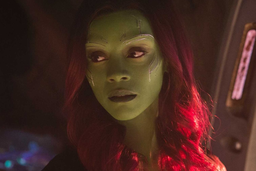 Gamora, a green alien with dark red hair.