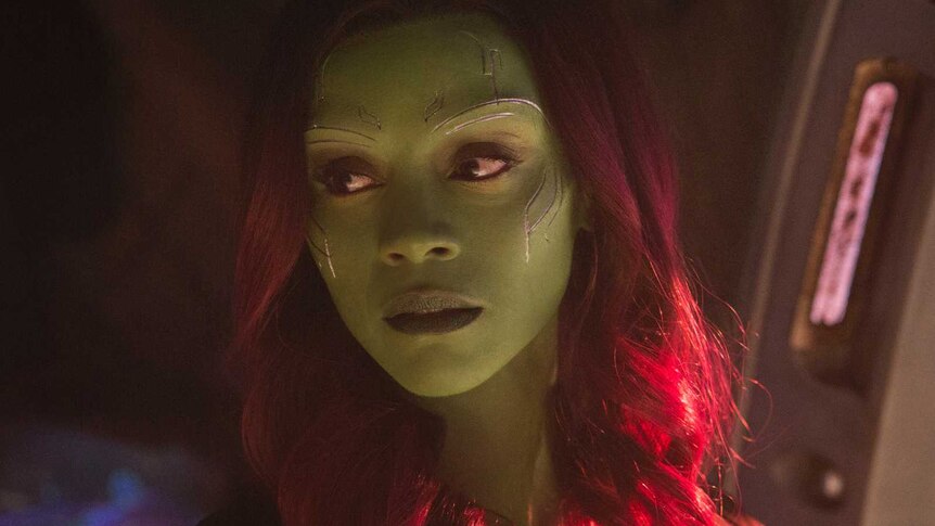 Gamora, a green alien with dark red hair.