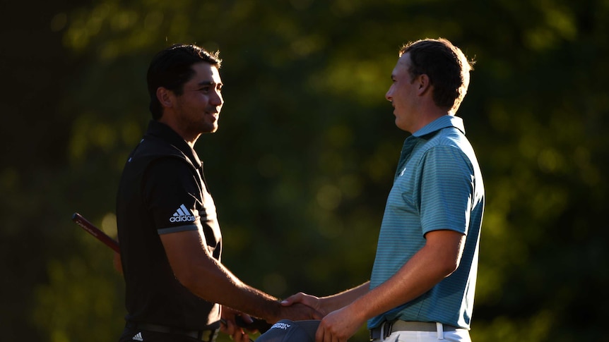 Jason Day shakes hands with Jordan Spieth