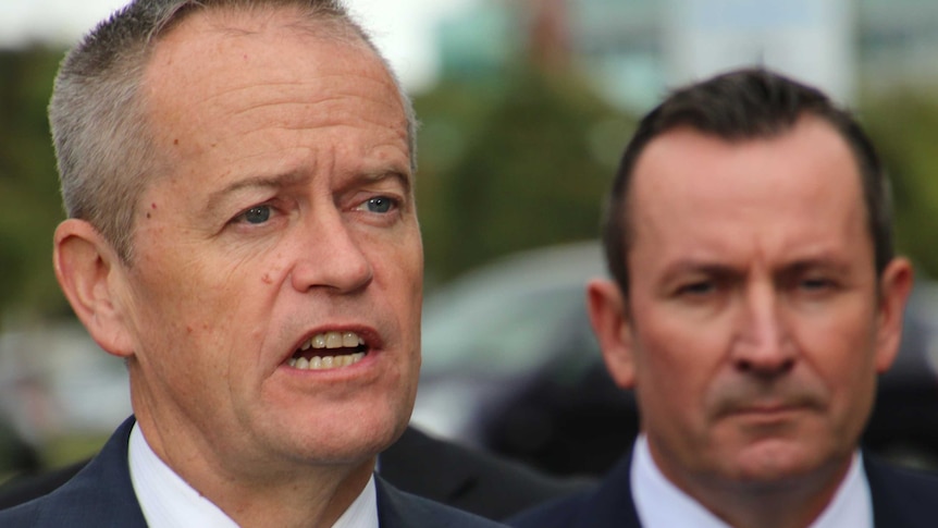 A close-up image of Federal Labor Leader Bill Shorten, with WA premier Mark McGowan behind him