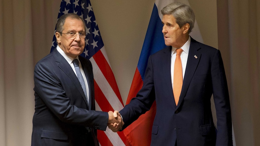 US Secretary of State John Kerry shakes hands with Russian Foreign Minister Sergey Lavrov.