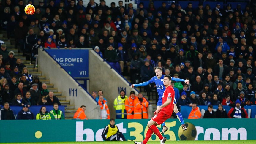 Jamie Vardy scores a long-range effort against Liverpool