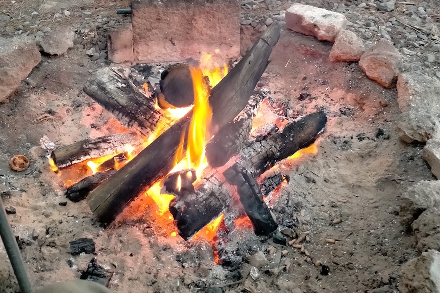 A photo of a fire at a campground