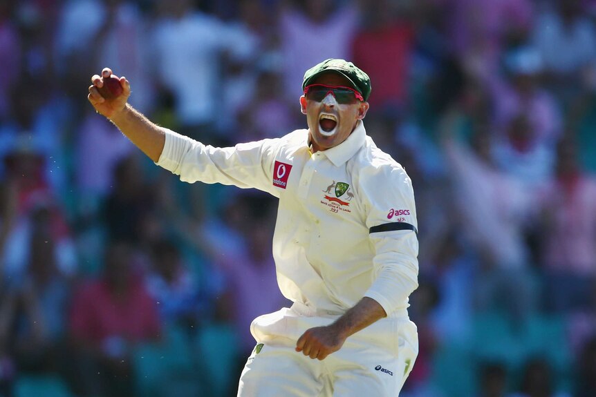 Crowd favourite ... Michael Hussey celebrates catching Thilan Samaraweera.