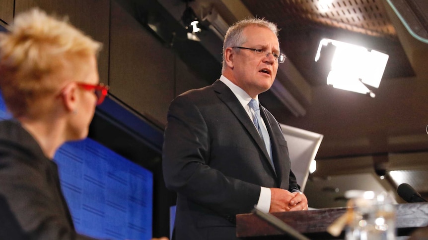 Scott Morrison stands at the Press Club podium.