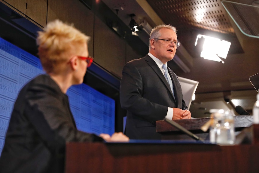 Scott Morrison stands at the Press Club podium.