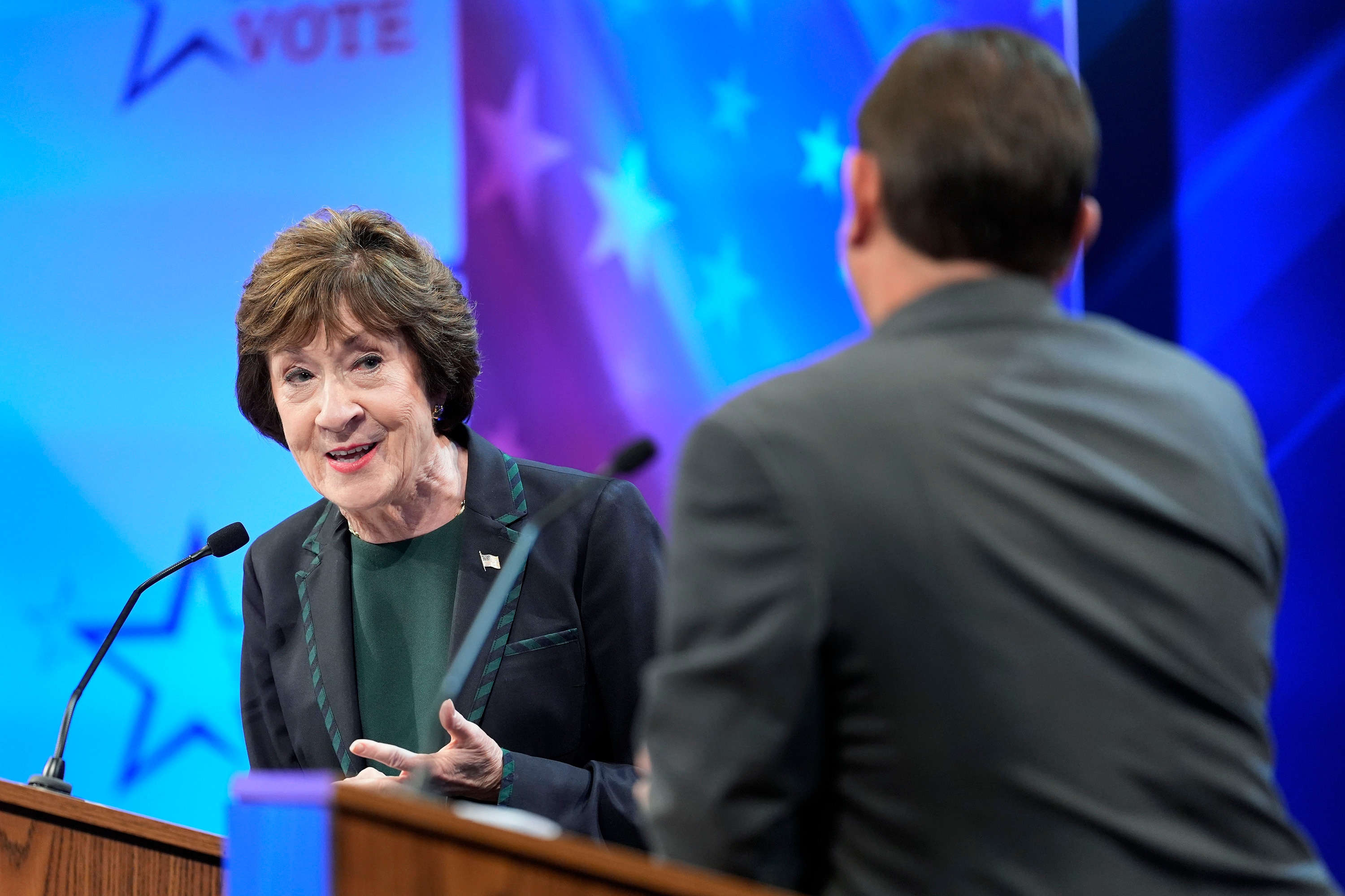 Trump's big midterm problems emerge in small-town debate