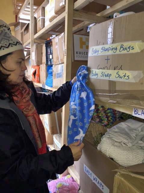 Katherine Hynes sorting clothes