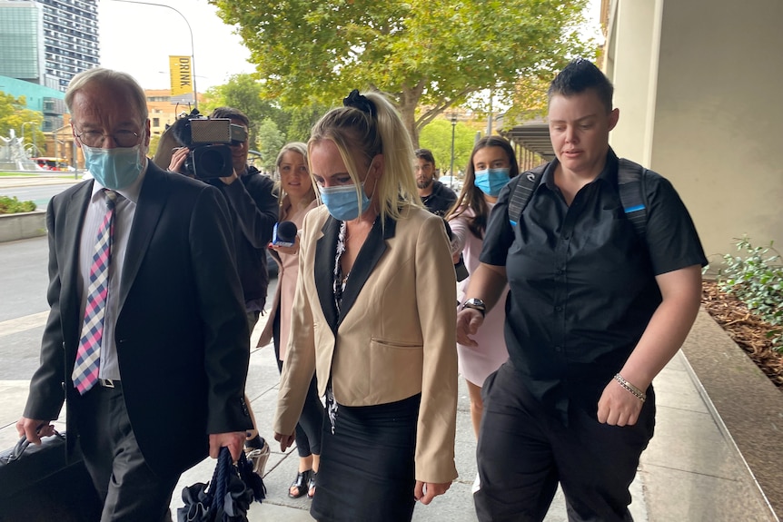 Port Pirie mother Ebanee Coad leaves court in Adelaide.