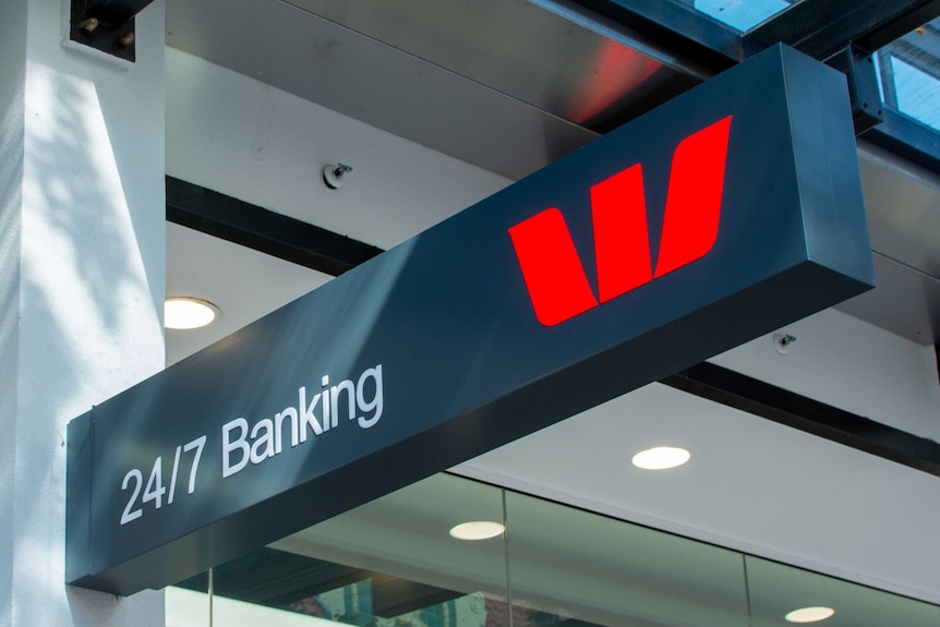 A sign that says 24/7 banking with a Westpac logo next to it.