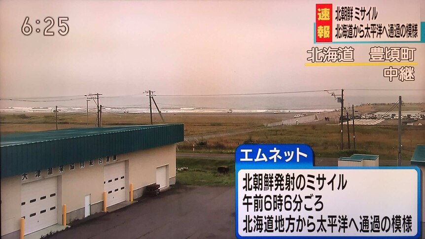 A still from a TV news report in Japan after North Korea launched a missile over the northern island.