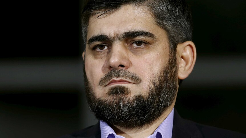 Mohammad Alloush of the Jaish al Islam faction and member of the High Negotiations Committee (HNC), during UN Syria Peace talks.