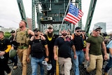 Proud Boys march across the Hawthorne Bridge in Portland