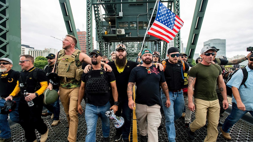 Proud Boys march across the Hawthorne Bridge in Portland