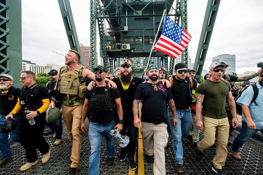 Proud Boys march across the Hawthorne Bridge in Portland