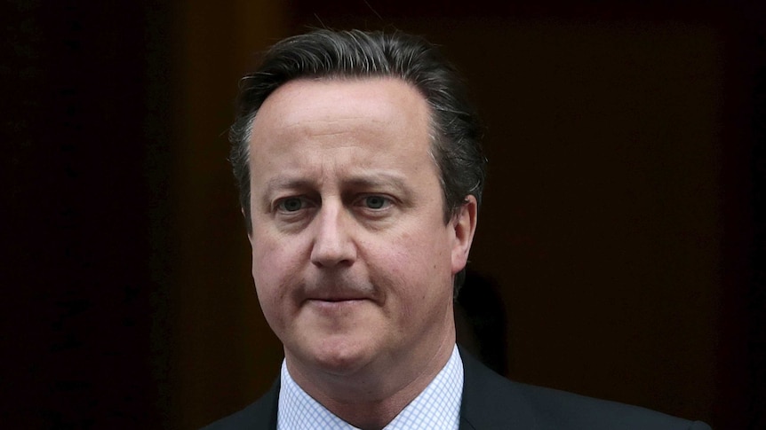 David Cameron looks grim.