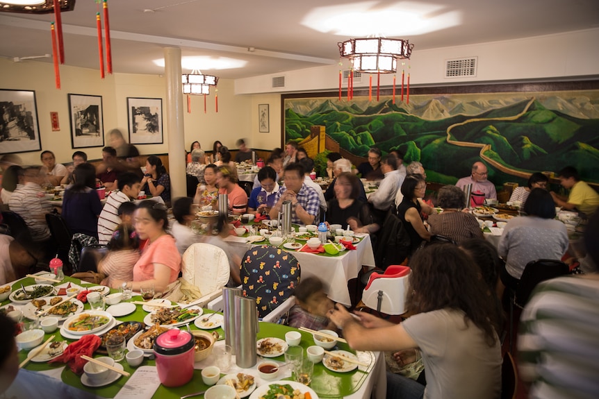 Happy's Chinese restaurant in Canberra bustling with activity on a Saturday afternoon.