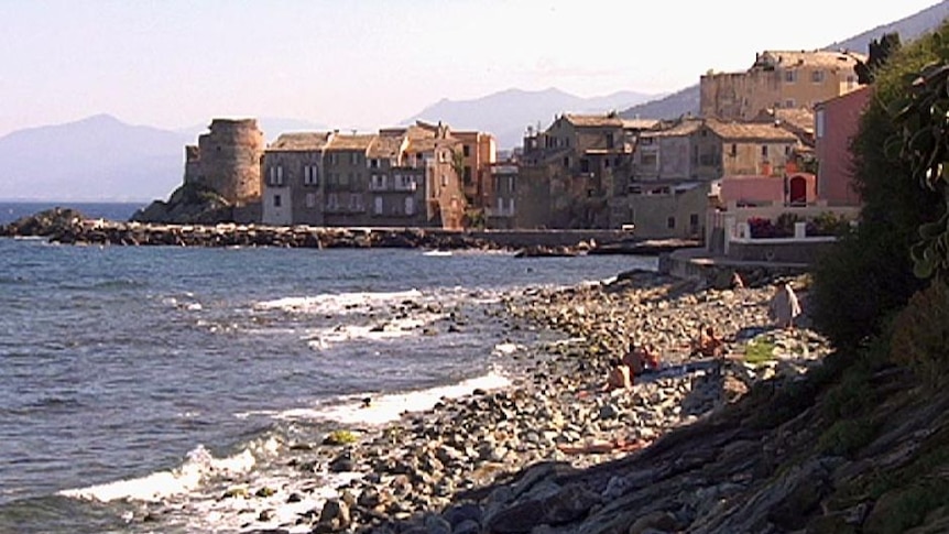 old stone buildings by the sea