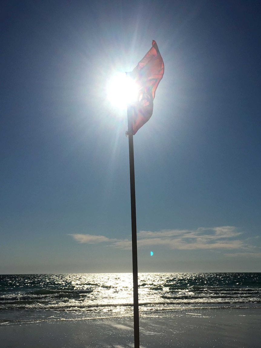 Red flags up at Cable Beach after a crocodile sighting.