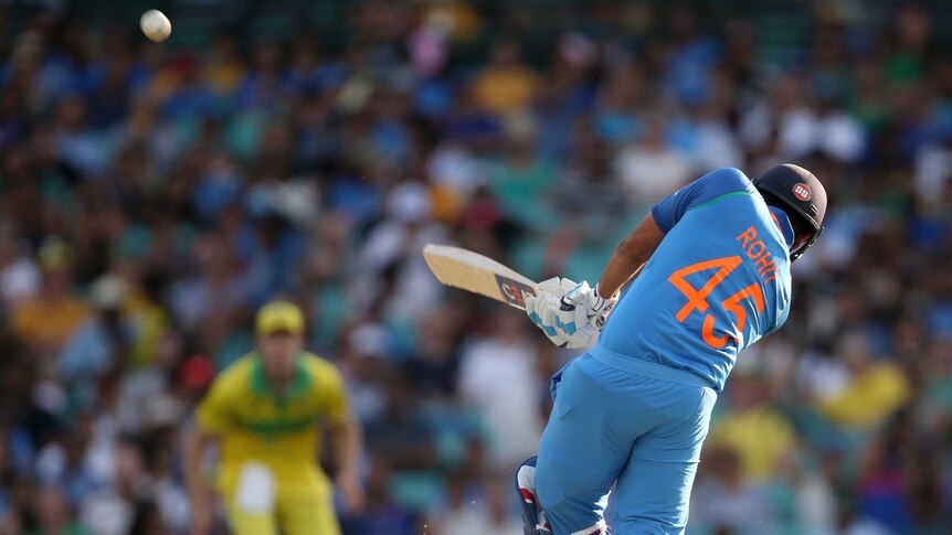 India's Rohit Sharma sends a ball into the stands against Australia at the SCG.