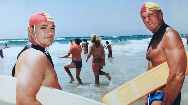 Peter Anderson (right) on patrol at Surfers Paradise beach with a fellow club member.