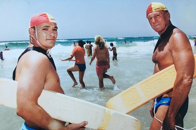 Peter Anderson (right) on patrol at Surfers Paradise beach with a fellow club member.