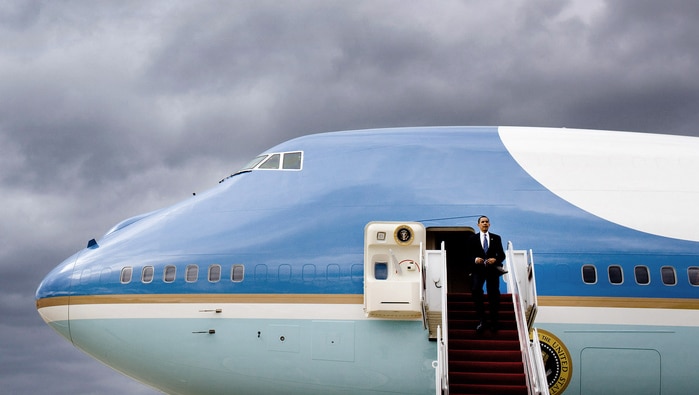 President Barack Obama disembarks from Air Force One
