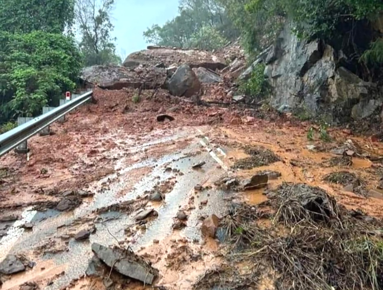 Heavy boulders have washed down across the Captain Cook Highway at Rex Lookout