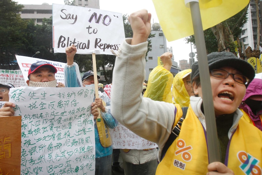Protesters to demand tax reform outside of Ministry of Finance in Taipei, Taiwan.