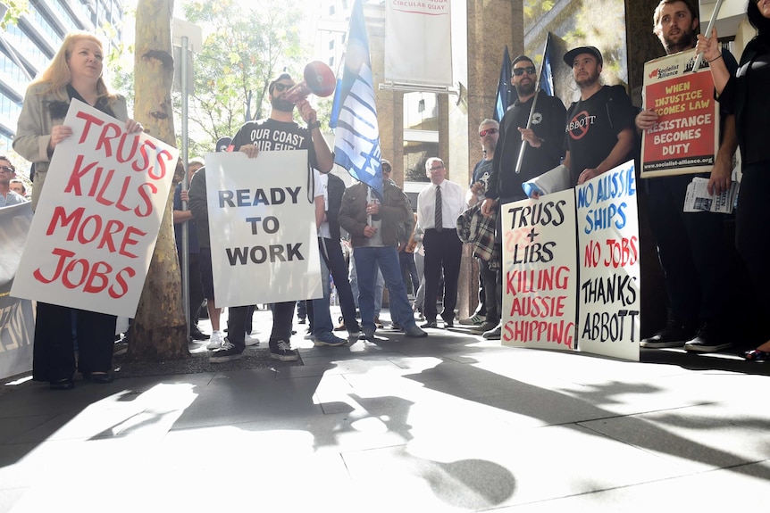 Demonstrators take part in a union protest in Sydney