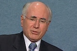 Mr Howard says troops may leave Iraq when progress has been made towards democracy.