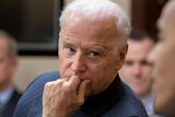 Joe Biden listens to Barack Obama during a meeting in the Situation Room