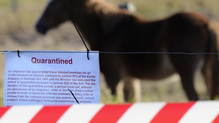 Quarantine sign on fence