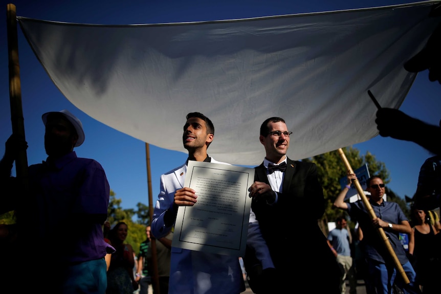 Two men get married at Jerusalem's Gay Pride parade