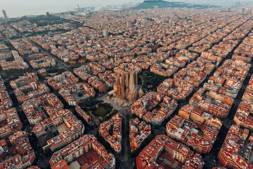 A view of the grid of Barcelona in Spain taken at sunset 