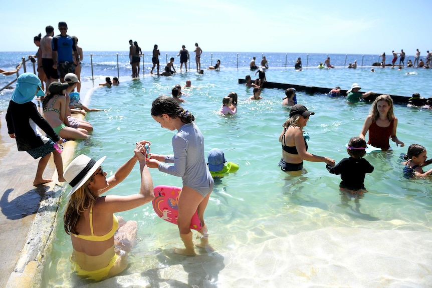 Swimmers in the ocean pool