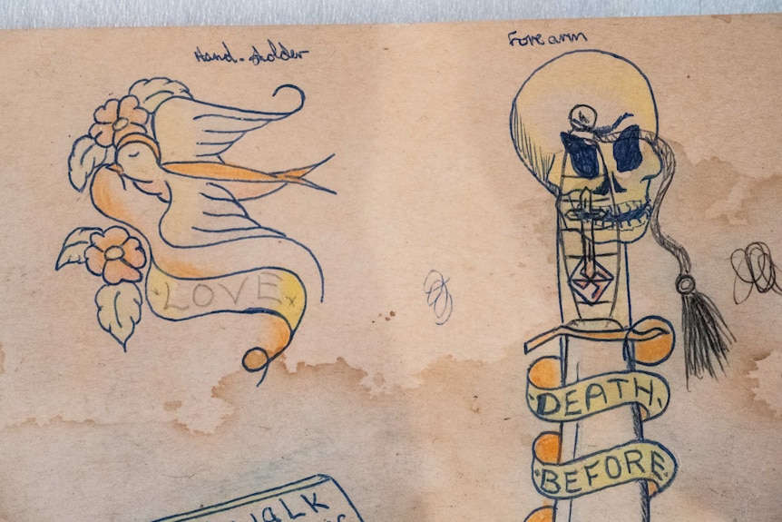 Tattoo design showing bird, skull, dagger drawing