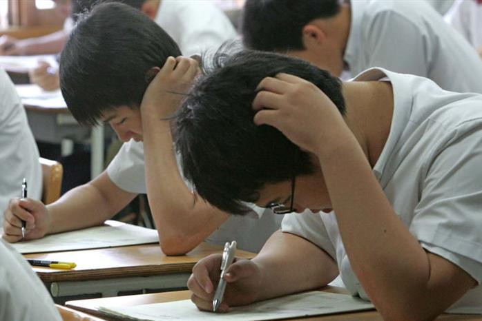 Students in Seoul take a mock college entrance test.