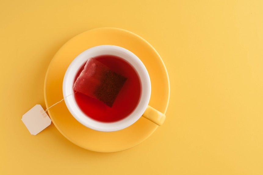 Cup of tea with teabag from above