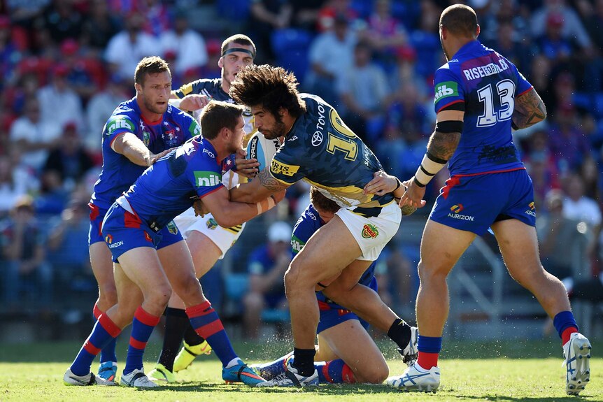 James Tamou takes on the Knights defence