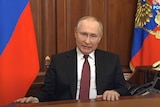 A still from a live stream of Vladimir Putin. 