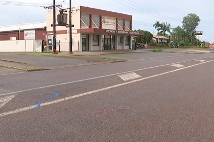 Road with police markings showing the scene of a fatal hit-and-run